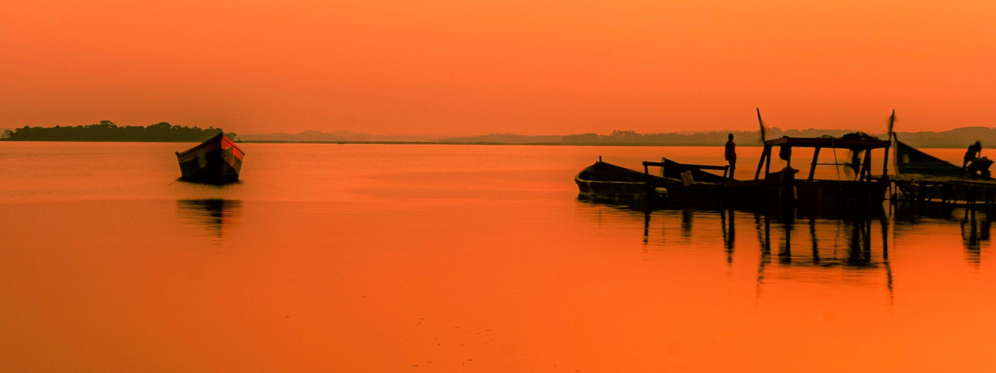 Golden hour op Ggaba Beach in Kampala.